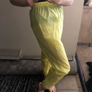 Bright yellow garbage bag pants